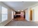 Open-concept living and dining area with adjacent kitchen at 10938 Delphi Dr, Camby, IN 46113