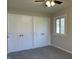 Bedroom with double closets and neutral wall colors at 2506 Colony Ct, Indianapolis, IN 46280