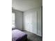 Bedroom with a large closet and neutral wall colors at 5236 Bluff View Dr, Indianapolis, IN 46217