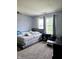 Spacious bedroom with king-size bed and large windows at 5236 Bluff View Dr, Indianapolis, IN 46217
