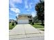 Two-story house with attached garage and a well-maintained lawn at 5236 Bluff View Dr, Indianapolis, IN 46217