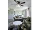 Living room with gray sofas, a marble coffee table, and hardwood floors at 5236 Bluff View Dr, Indianapolis, IN 46217