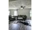 Spacious living room with gray sofas, coffee table, and hardwood floors at 5236 Bluff View Dr, Indianapolis, IN 46217