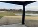 View of a pond from a covered patio at 5589 Cattail Branch Ln, Clayton, IN 46118