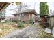 Large backyard with mature trees and garden at 1330 N Bosart Ave, Indianapolis, IN 46201
