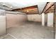 Unfinished basement with concrete floor and exposed beams at 1330 N Bosart Ave, Indianapolis, IN 46201