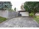 Detached single-car garage with a driveway at 1330 N Bosart Ave, Indianapolis, IN 46201