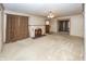 Spacious living room with hardwood floors and fireplace at 1330 N Bosart Ave, Indianapolis, IN 46201