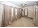 Sunroom with three windows and beige curtains at 1330 N Bosart Ave, Indianapolis, IN 46201