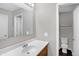 Main bathroom with toilet and single sink vanity at 1709 Queensbridge Dr, Indianapolis, IN 46219