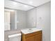 Simple bathroom with light wood vanity and large mirror at 1709 Queensbridge Dr, Indianapolis, IN 46219