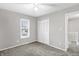 Bedroom with ceiling fan, carpet, and closet at 1709 Queensbridge Dr, Indianapolis, IN 46219