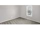Bright bedroom with carpet and window at 1709 Queensbridge Dr, Indianapolis, IN 46219