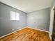 Simple bedroom with hardwood floors at 2433 Winfield Ave, Indianapolis, IN 46222