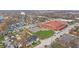 Aerial view of a residential neighborhood with a school and playground at 329 Lincoln St, Indianapolis, IN 46225