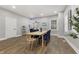 Bright dining room with hardwood floors and a large wooden table at 329 Lincoln St, Indianapolis, IN 46225