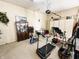 Home gym with treadmill, exercise bike, and other fitness equipment at 7919 W County Road 100 South, Coatesville, IN 46121