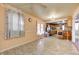 Combined dining and kitchen area with tile flooring and wood cabinets at 80 S Mickley Ave, Indianapolis, IN 46241