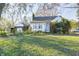 Brick ranch house with attached garage and spacious yard at 80 S Mickley Ave, Indianapolis, IN 46241