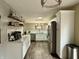 Modern kitchen with white cabinets, marble countertops, and stainless steel appliances at 10048 New Dawn Pl, Avon, IN 46123