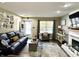 Cozy living room featuring a fireplace and comfortable seating at 10048 New Dawn Pl, Avon, IN 46123