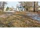 Spacious backyard with a small shed and a fire pit area at 11365 W State Road 142, Martinsville, IN 46151