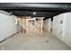 Unfinished basement with open stairway and framing at 11365 W State Road 142, Martinsville, IN 46151