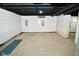 Unfinished basement with waterproofing and support beams at 11365 W State Road 142, Martinsville, IN 46151