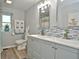 Updated bathroom with double vanity, new fixtures, and a tiled shower/tub at 11365 W State Road 142, Martinsville, IN 46151