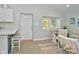 Open concept dining area with a table and chairs adjacent to the kitchen at 11365 W State Road 142, Martinsville, IN 46151