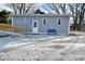 Gray exterior with white door, ramp, and blue bench at 11365 W State Road 142, Martinsville, IN 46151