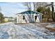 Rear view of gray house with teal accents at 11365 W State Road 142, Martinsville, IN 46151