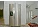 Stainless steel refrigerator in a modern kitchen with white cabinetry at 11365 W State Road 142, Martinsville, IN 46151