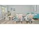 Bright and airy living room with teal couch and decorative accents at 11365 W State Road 142, Martinsville, IN 46151