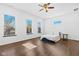 Bright bedroom with hardwood floors and ceiling fan at 1210 Churchman Ave, Indianapolis, IN 46203