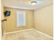 Bedroom featuring wall-mounted TV and built-in shelving at 1502 Autumn Oak St, Greenwood, IN 46143