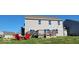 Two-story house with deck and backyard at 3801 Boundary Bay Dr, Indianapolis, IN 46217