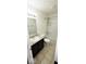 Clean bathroom with dark vanity, shower/tub combo at 3801 Boundary Bay Dr, Indianapolis, IN 46217