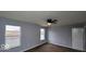 Bedroom featuring two large windows and a ceiling fan at 3801 Boundary Bay Dr, Indianapolis, IN 46217