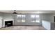 Spacious living room with fireplace and large windows at 3801 Boundary Bay Dr, Indianapolis, IN 46217