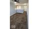 Spacious upstairs hallway with ceiling fan and access to bedrooms at 3801 Boundary Bay Dr, Indianapolis, IN 46217