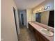 Bathroom with double vanity, and a separate shower and tub at 4101 Ansar Ln, Indianapolis, IN 46254