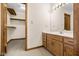 Bathroom with vanity, walk-in closet, and neutral tones at 5059 Countess Dr, Columbus, IN 47203