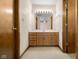 Bathroom with vanity, mirror, and neutral finishes at 5059 Countess Dr, Columbus, IN 47203
