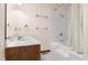 Bathroom features a bathtub, shower, and vanity at 5059 Countess Dr, Columbus, IN 47203