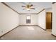 Spacious bedroom with neutral walls and a ceiling fan at 5059 Countess Dr, Columbus, IN 47203