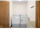 Laundry room with washer, dryer, and utility sink at 5059 Countess Dr, Columbus, IN 47203