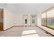 Living room with access to backyard and neutral color scheme at 5059 Countess Dr, Columbus, IN 47203