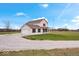 Two-story house with attached garage, front yard view at 6005 S Darlington Rd, Jamestown, IN 46147