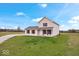 Two-story house with brown accents and a front porch at 6005 S Darlington Rd, Jamestown, IN 46147